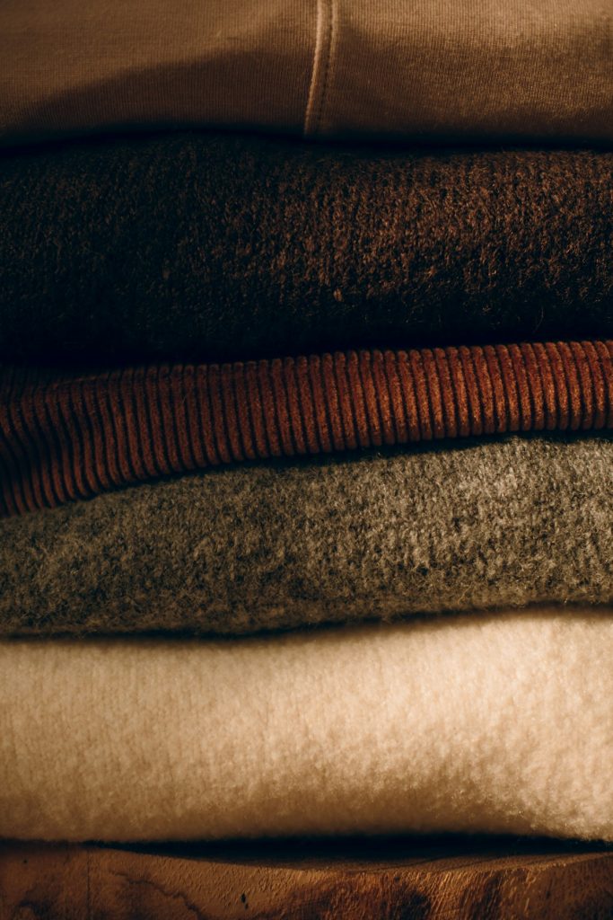 Close-up of folded garments in neutral tones